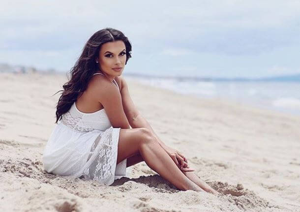 Joy Taylor on the beach.
